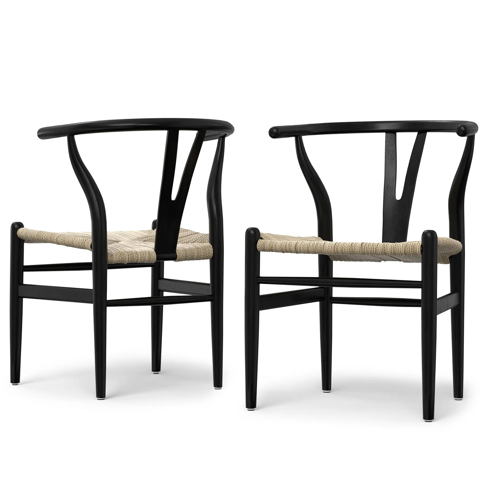 An assortment of mid century modern chair designs displayed in a bright studio.