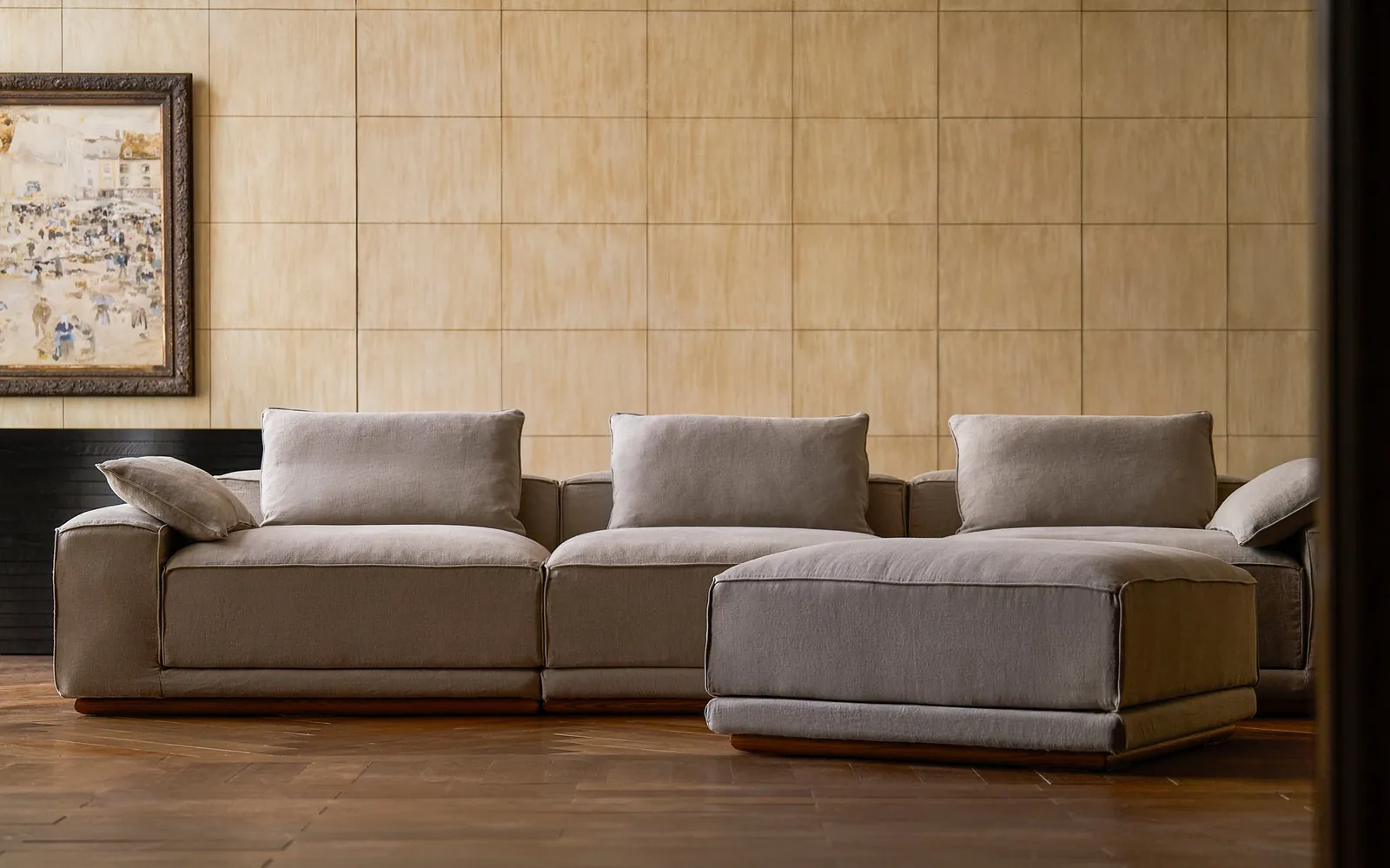A chaise sectional fits properly with ample walking space around it.