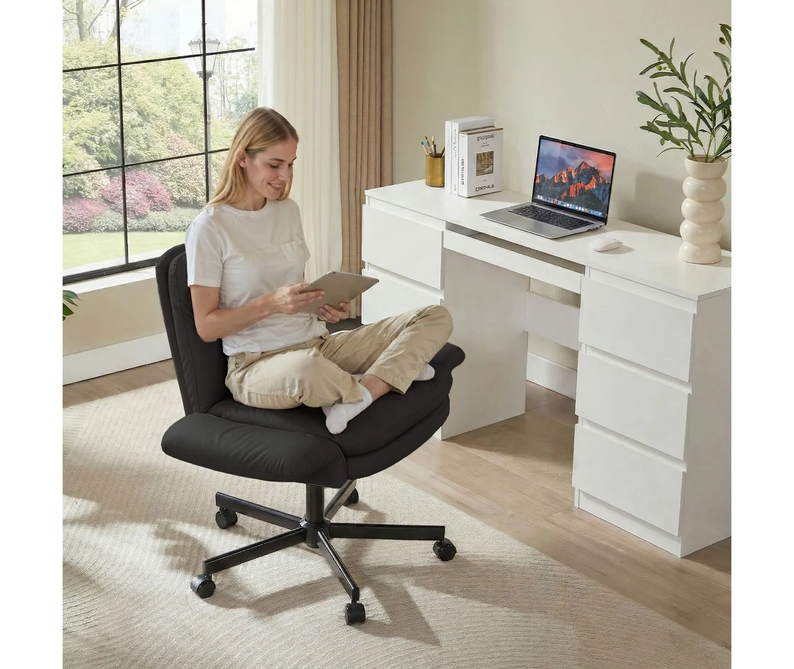 A cheap desk chair tilted dangerously backward with a cracked plastic caster wheel.