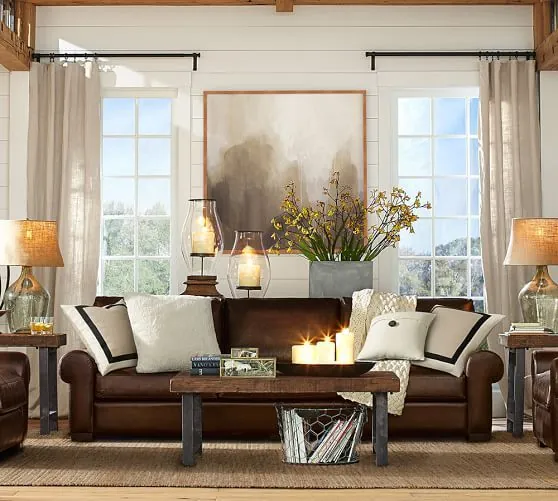 A clean and well-maintained brown couch in a bright and tidy living space.