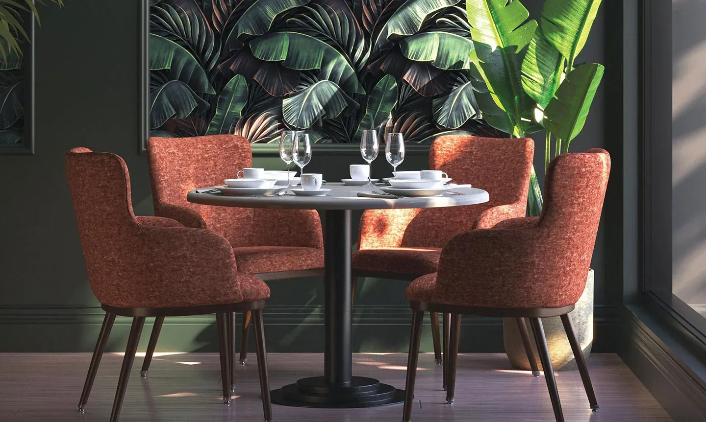 A clear glass dining table set on a rug in a bright room.