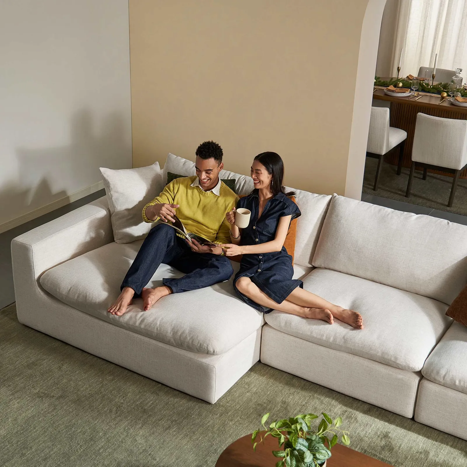 Close-up of the interlocking corner wedge piece on a modular sectional sofa.