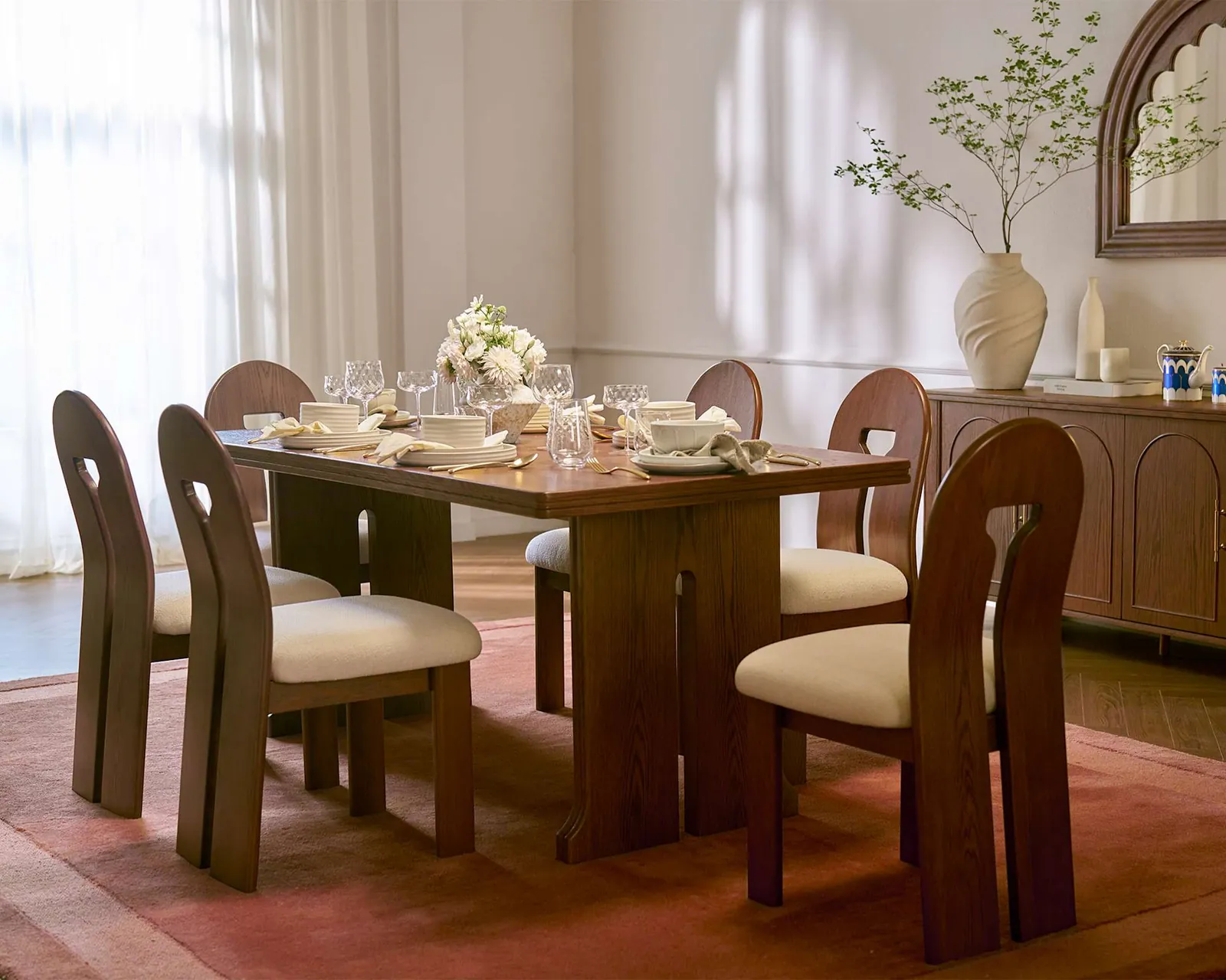 Close up of the mechanical joinery on an expandable wooden dining table.