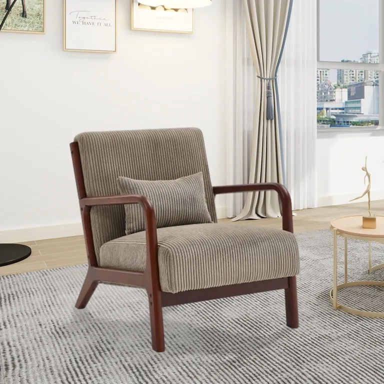 A collection of various mid-century modern accent chairs displayed in a clean studio space.