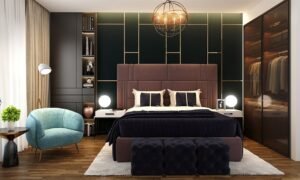 A comfortable bedroom chair creates a cozy reading nook in a bright bedroom.