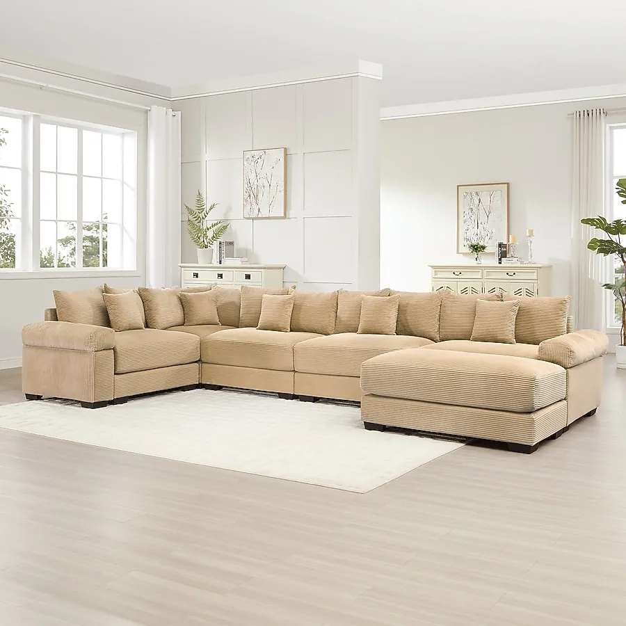 Comparing the width of a compact chaise sectional versus a large modular sofa.