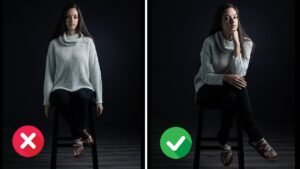 A confident person demonstrating how to pose while sitting on a chair.