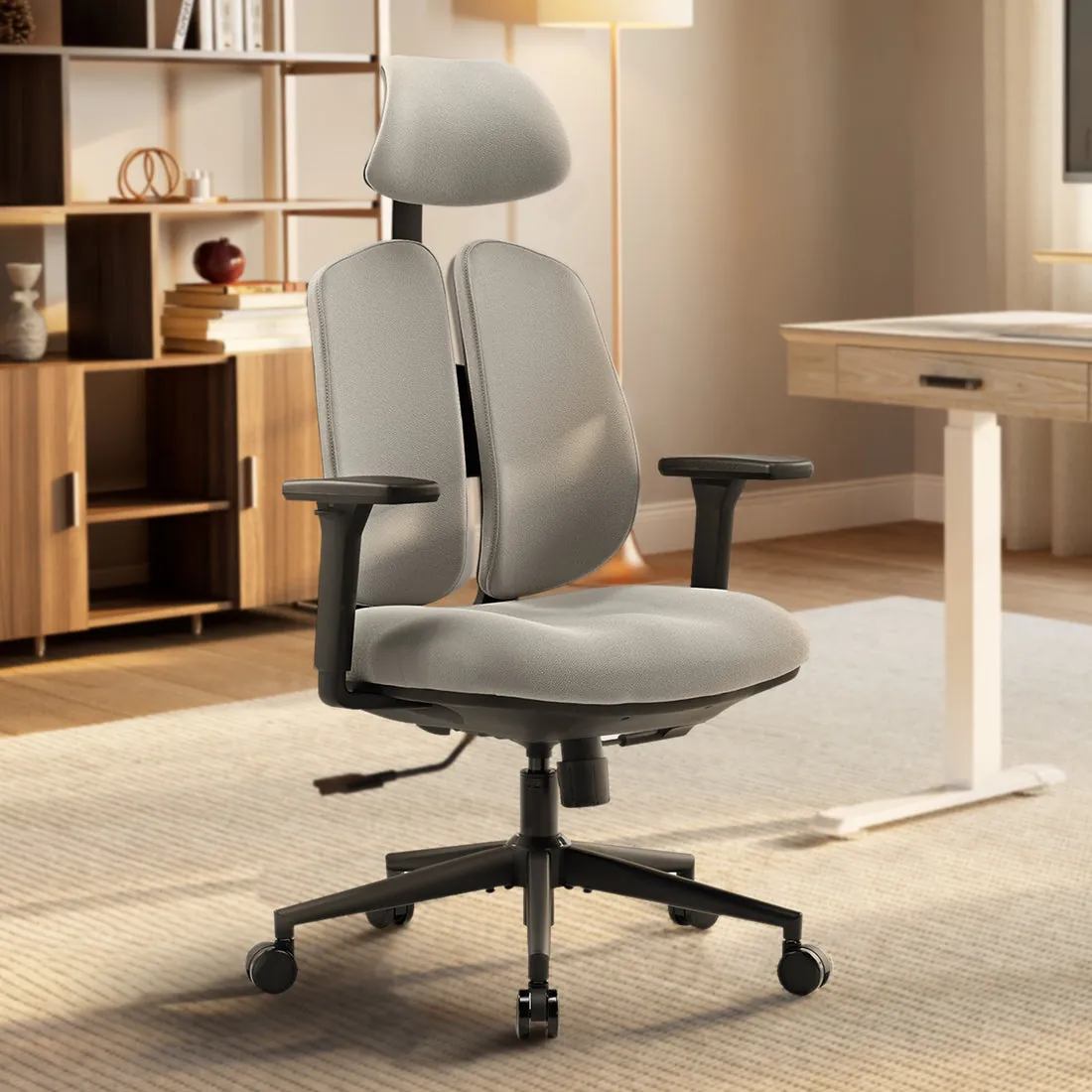 Detailed view of the mechanical spindle and bearing components of a swivel chair.