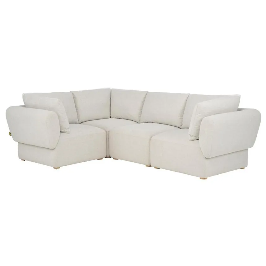 Different modular sofa components including a corner unit, armless chair, and ottoman.