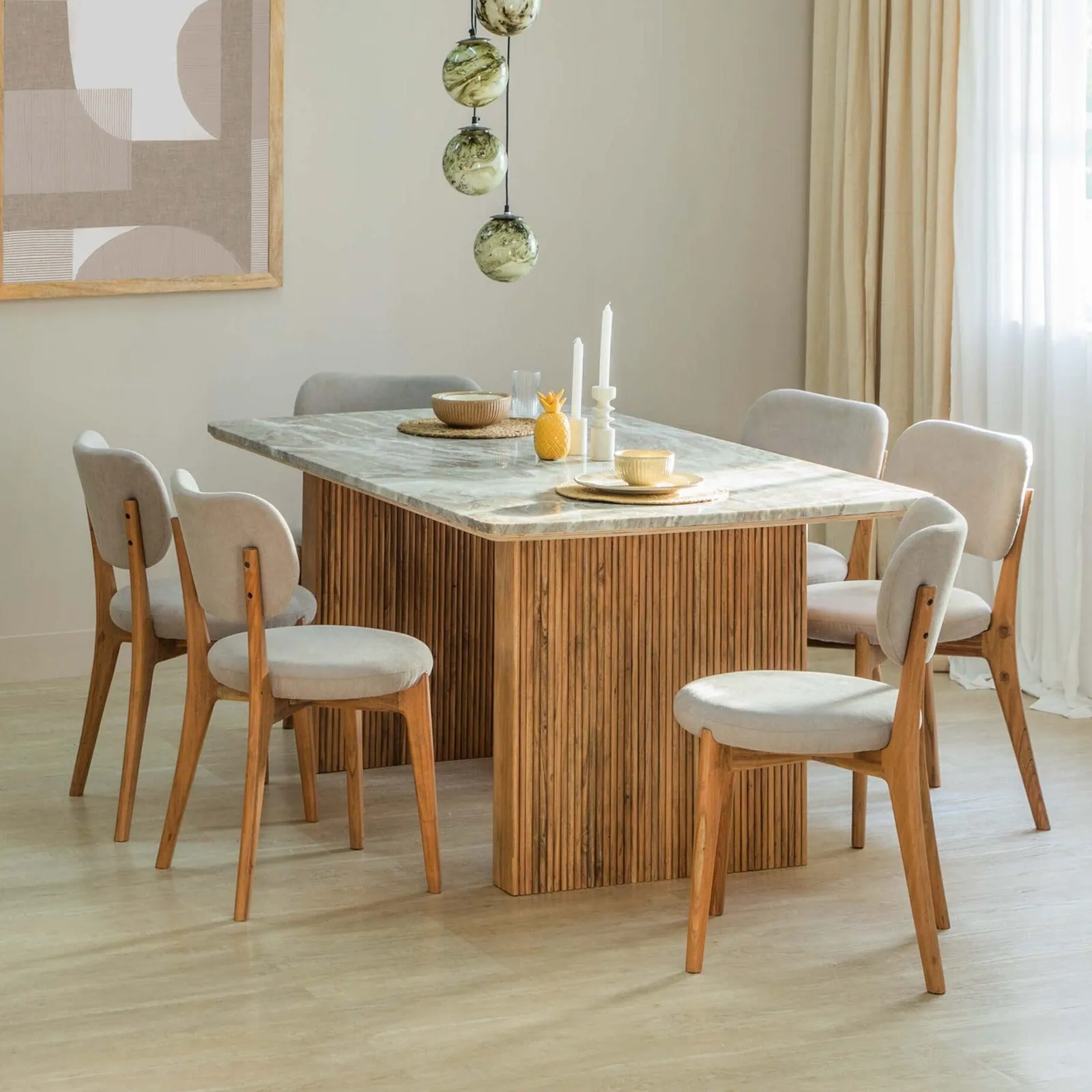 A dining chair scraping a wall due to insufficient clearance space.