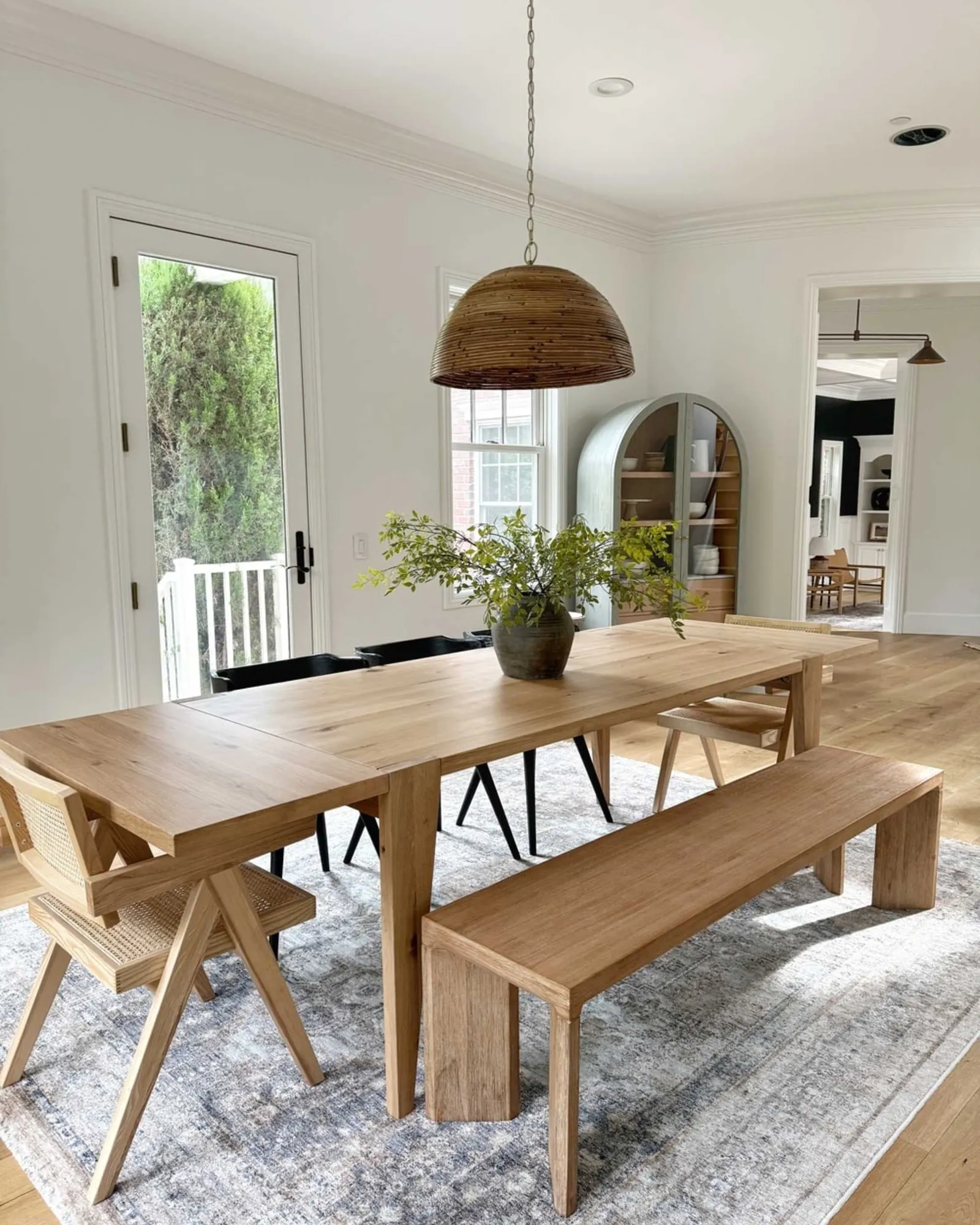 A drop-leaf dining table demonstrates how to adjust length for smaller living room spaces.
