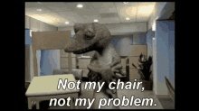 An empty office chair stands alone in a shared workspace with other chairs nearby.