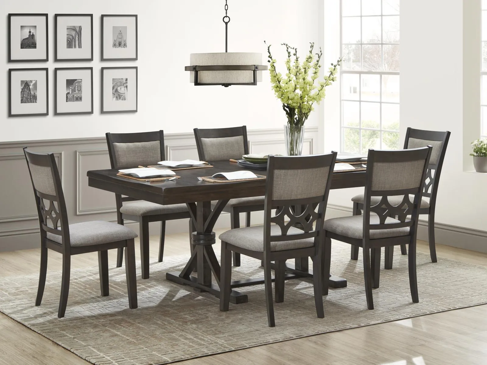 Essential moving supplies like blankets and bubble wrap for protecting a dining table.