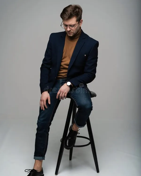 Essential photography gear including a simple wooden chair and tripod for seated modeling practice.