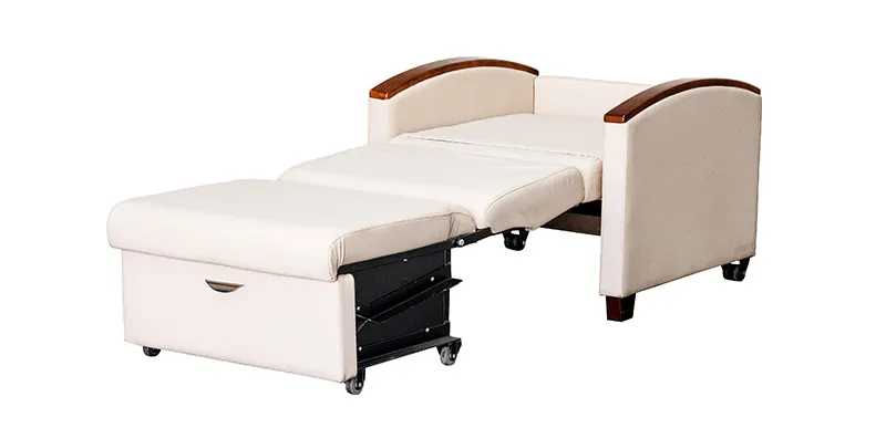 Hands carefully pulling the frame of a convertible chair to unfold it into a bed.