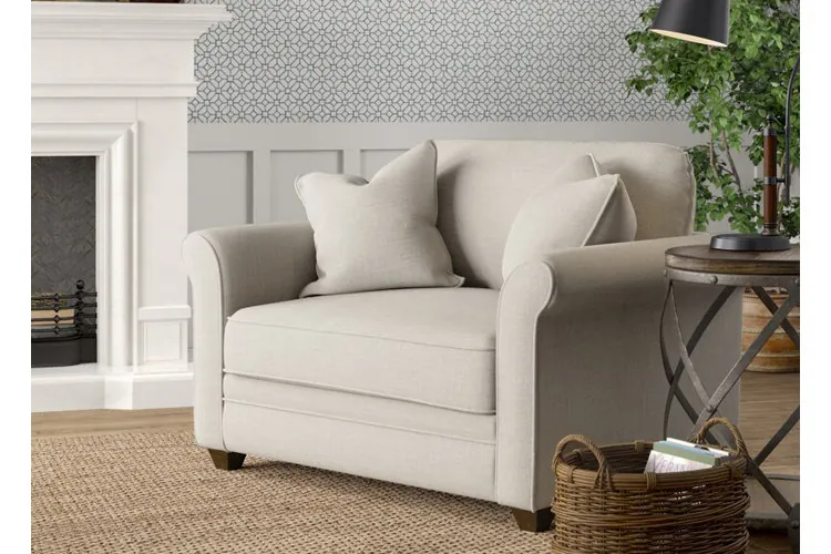 Living room chairs showing different arm heights and frame structures