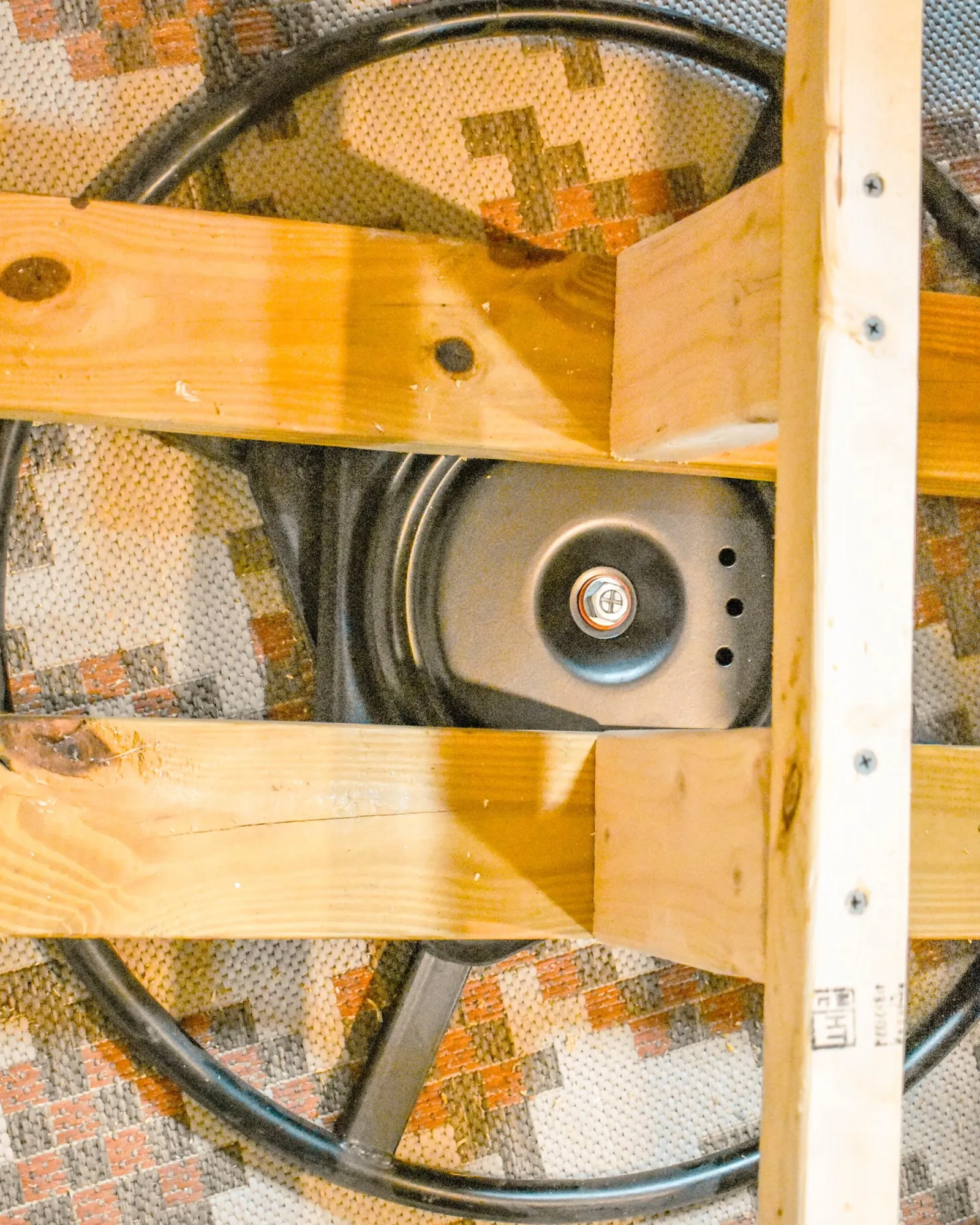 Maintenance tools arranged for troubleshooting and repairing a swivel chair mechanism.