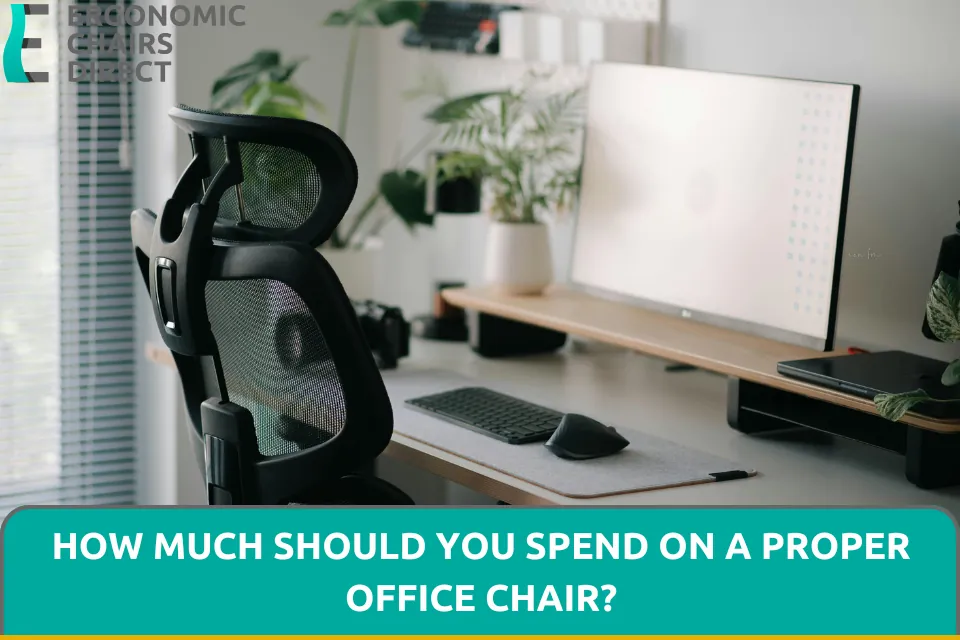 Measuring tape and work shoes on a floor near an adjustable office chair.