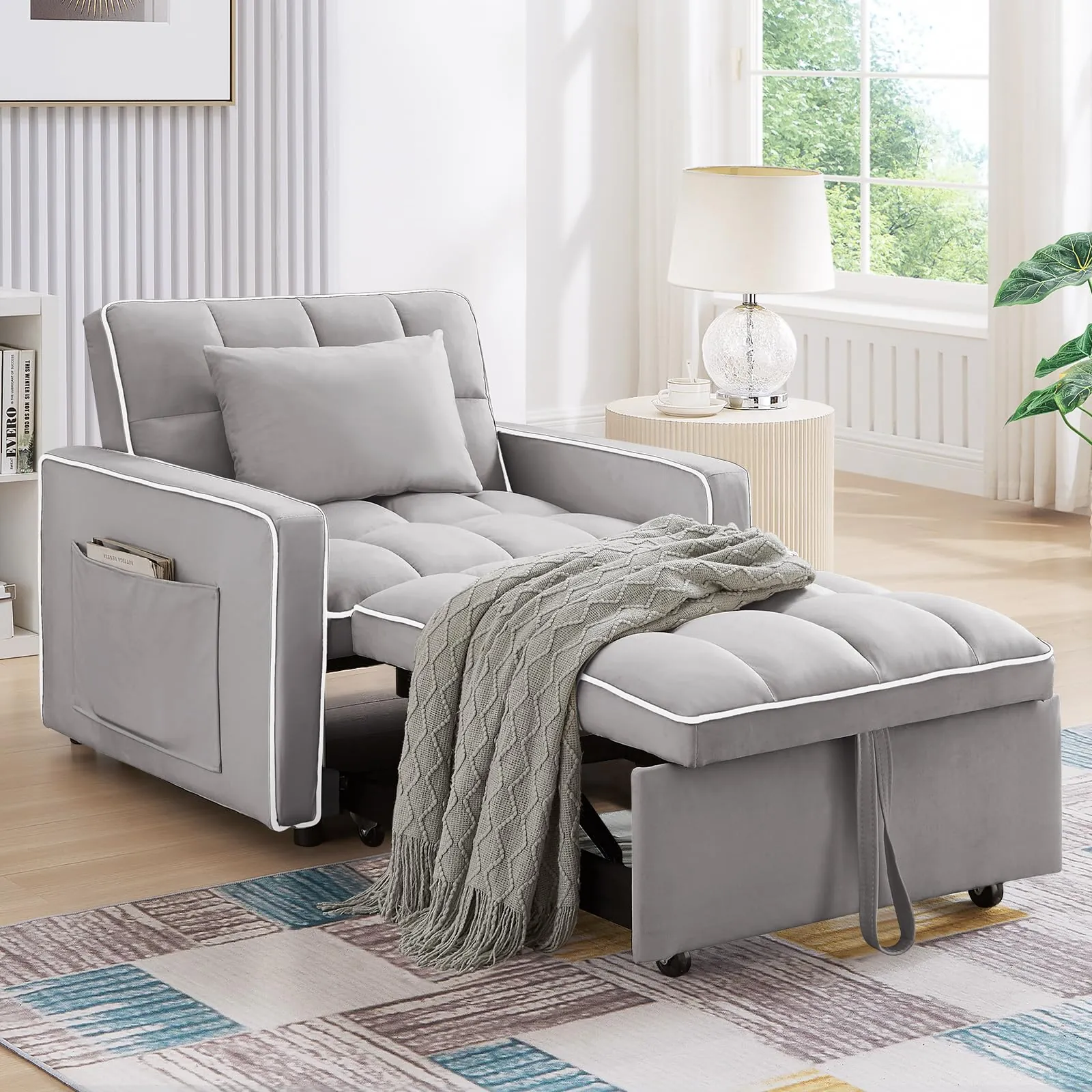 The mechanical hinge of a click-clack chair bed frame.