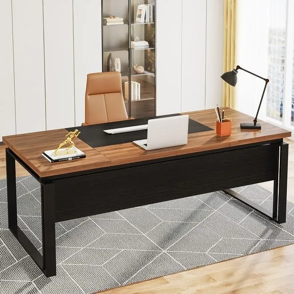 A messy office desk with poor cable management and improper chair height.