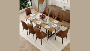 A modern dining table set arranged in a bright and airy home dining room.