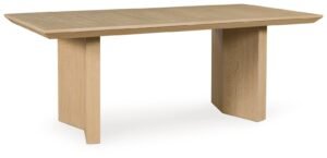 A modern dining table set in a sunlit room for home dining.