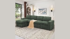 A modern, L-shaped sectional couch centered in a bright, airy, and contemporary living room.