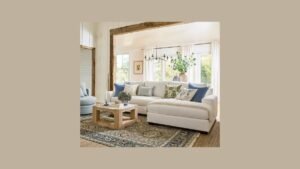 A modern L-shaped sectional sofa sits in a bright, well-lit living room.