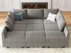A modern modular sectional couch sits in a bright and airy living room space.