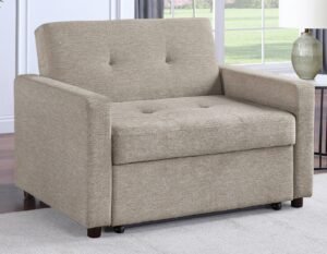 A modern sleeper chair sits in a bright living room ready for guests.