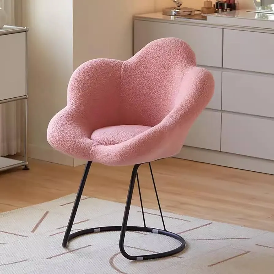 An oversized bedroom chair that overwhelms the space and creates a design mistake.