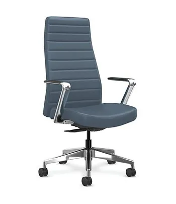 Oversized conference chairs crowded around a table causing a cramped office space.