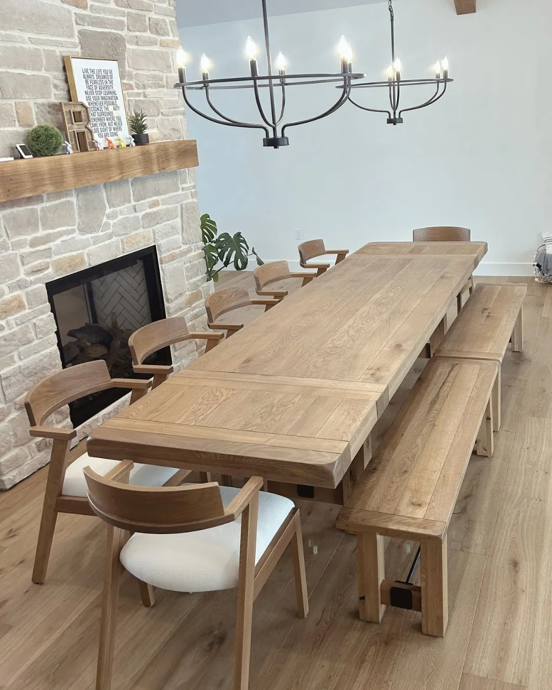 Painter's tape outlines the space for a dining room table on the floor.