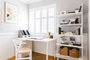 A peaceful armchair in a tidy bedroom creates a comfortable reading nook space.