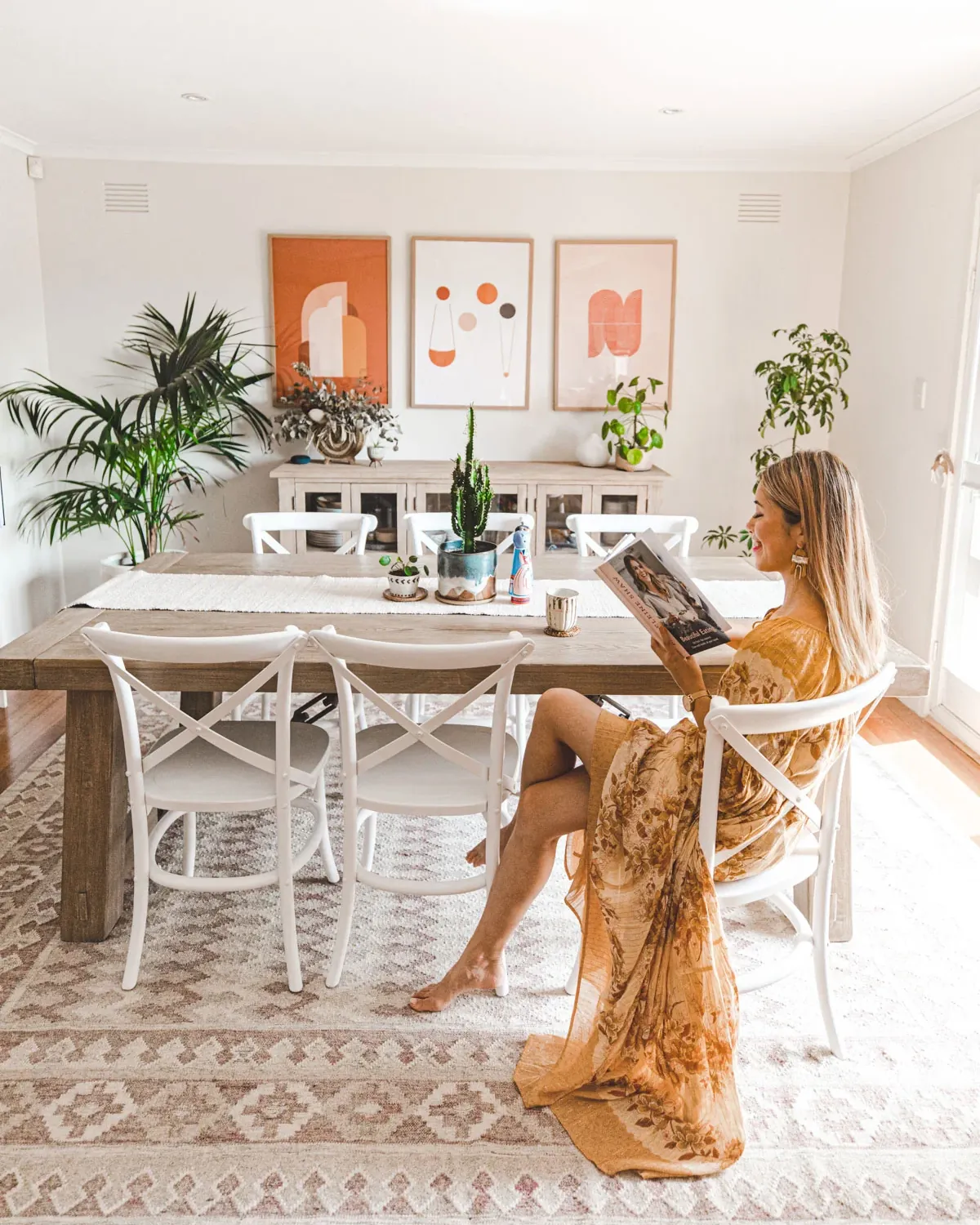A perfectly clean and organized dining table in a quiet, well-lit room.