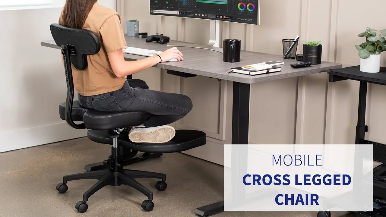 A person maintaining proper posture on an ergonomic office chair at a desk.