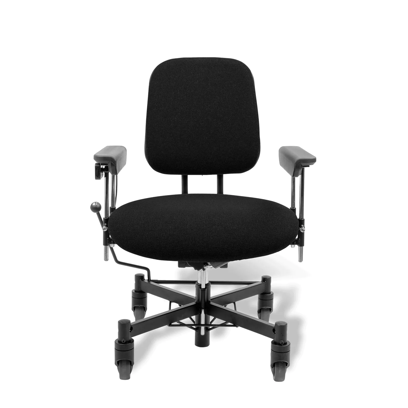 A person works at a desk while sitting in a comfortable swivel chair.