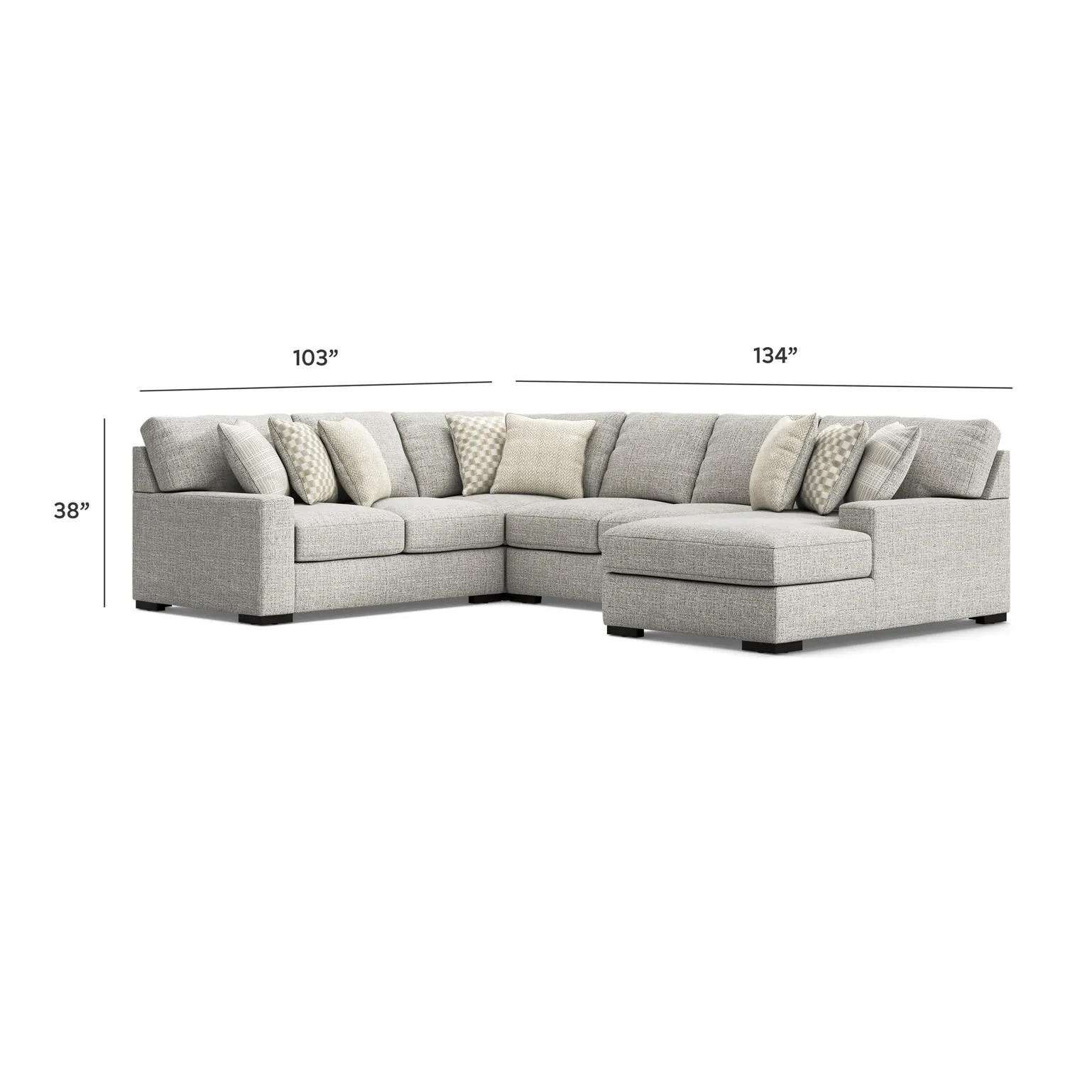 A poorly placed sectional blocking a walkway in a cramped living room.