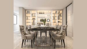 Round oak dining table with chairs in a bright spacious modern dining room.