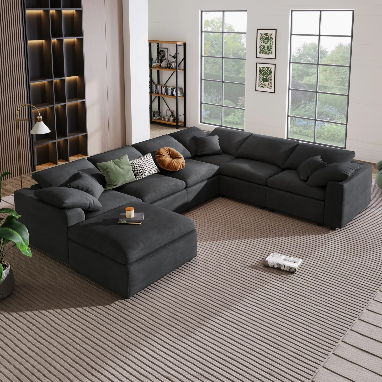 A sectional couch with a tape measure on the floor to show its dimensions.