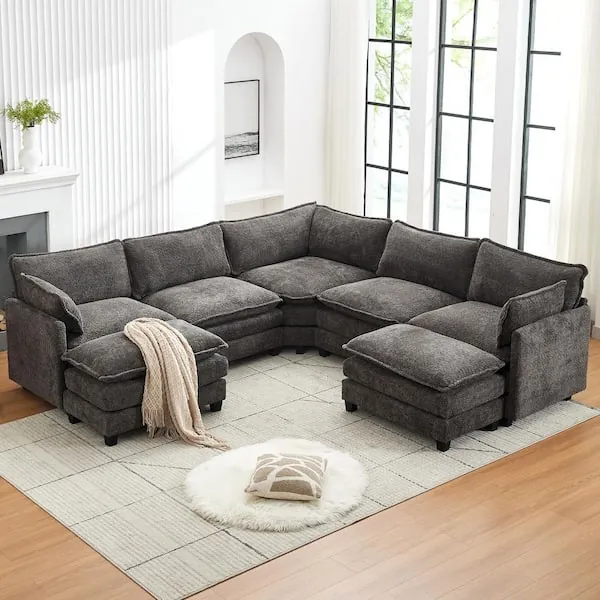 A sectional sofa positioned too close to a door frame in a living room.