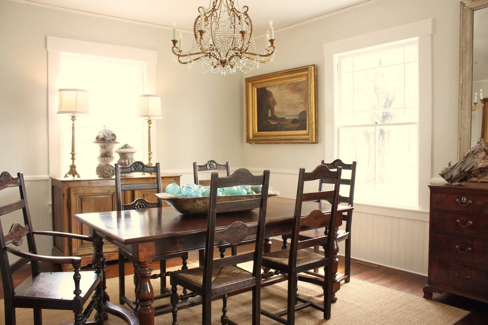 A selection of different dining table styles displayed in a modern showroom.