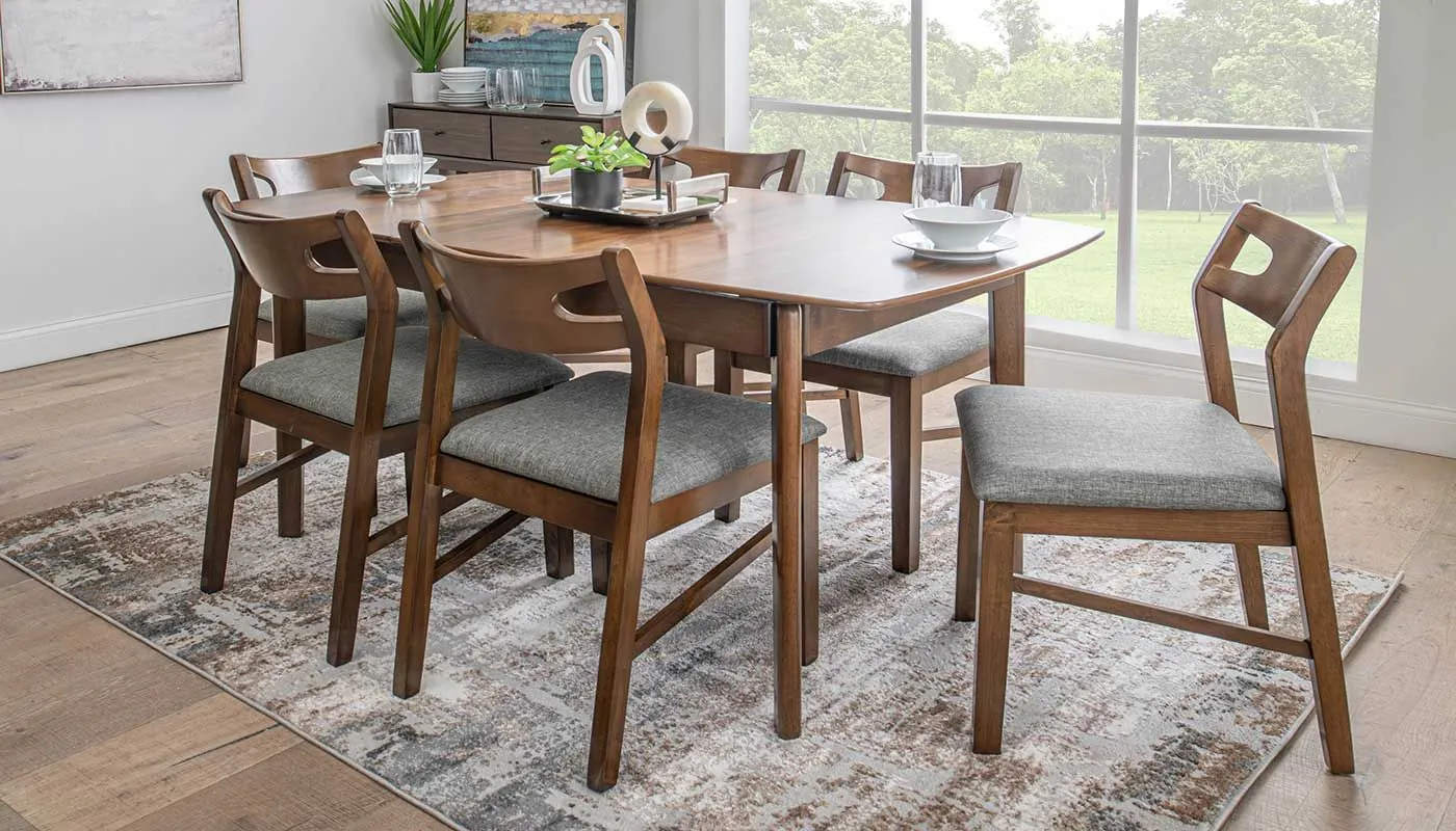 A space-saving drop-leaf dining table set in a small apartment nook.