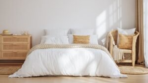 A stylish accent chair fits perfectly in a small bedroom to maximize floor space.