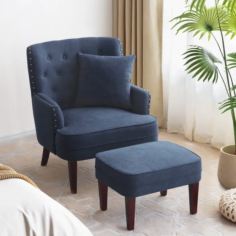 Three different styles of navy blue accent chairs displayed in a home showroom.