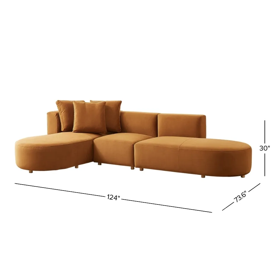 Two different sectional sofas sit side by side in a showroom.