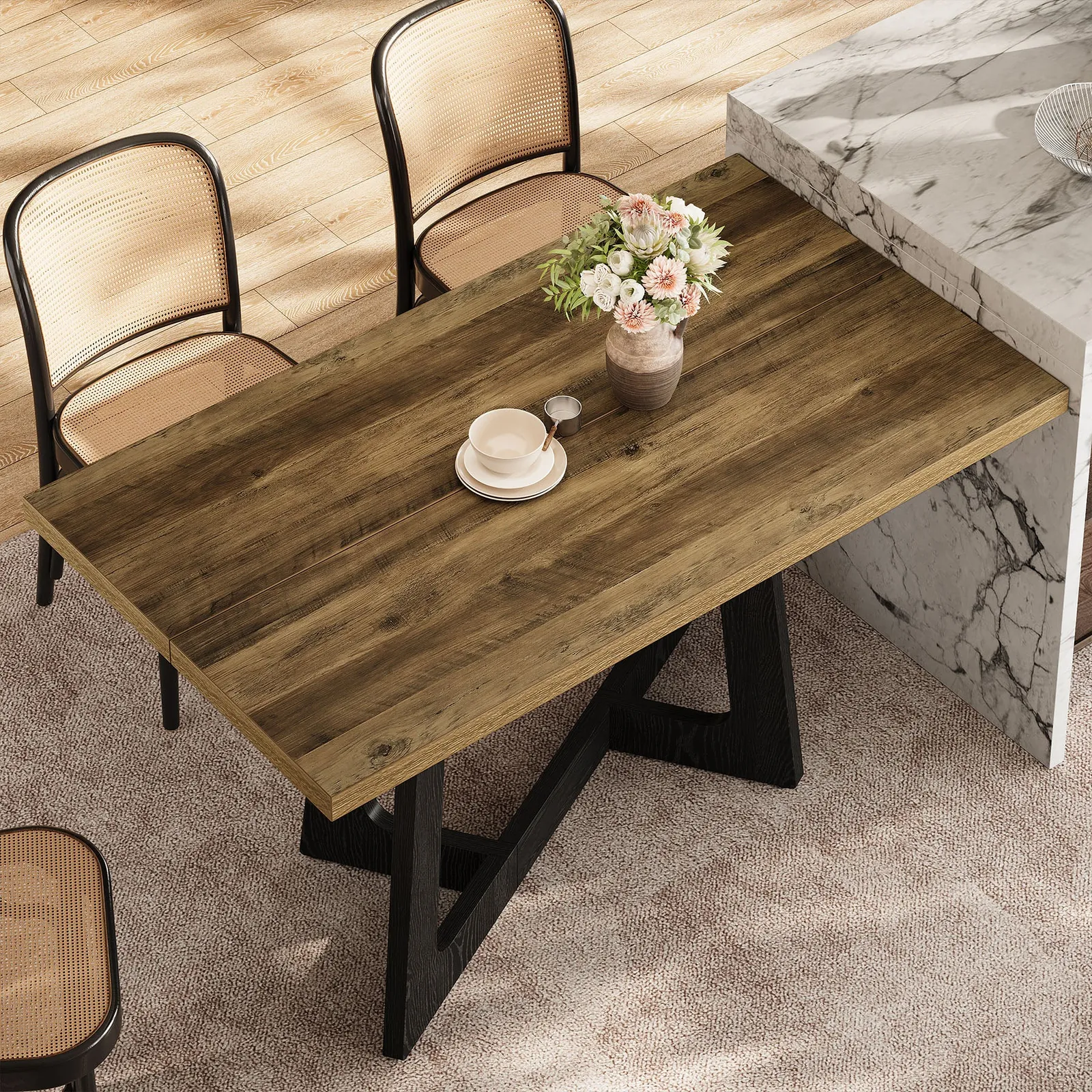 Two identical dark wood dining tables placed too closely in one room.