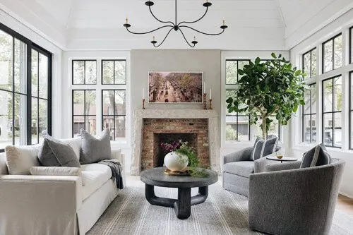 Two swivel chairs positioned in an open living space with plenty of room.