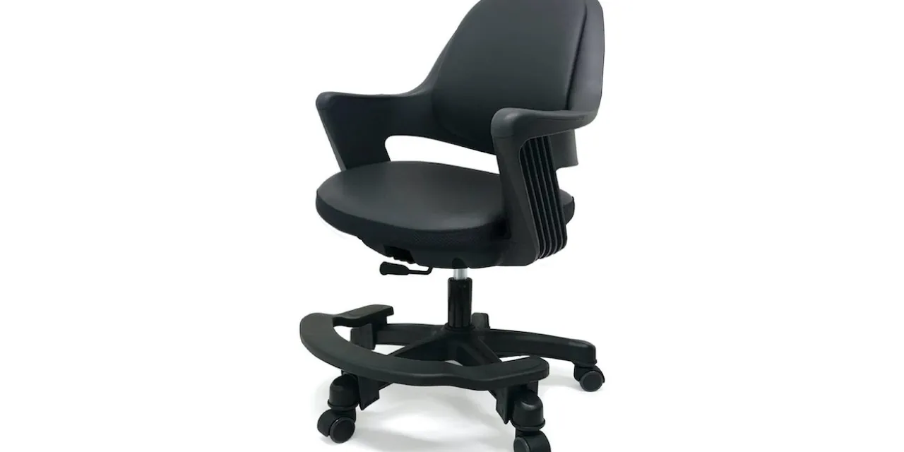 Worn display office chair compared to new stock in showroom
